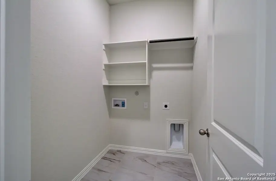 Furnished interior view inside a new home in Veranda, San Antonio (Image 3).