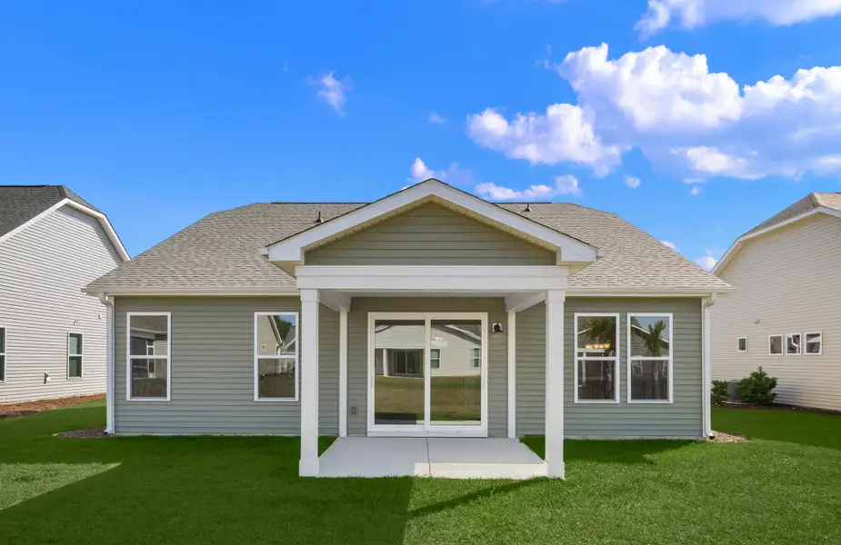 Exterior details and patio area of a home in Coastal Club of the Carolinas, Calabash (Image 3).