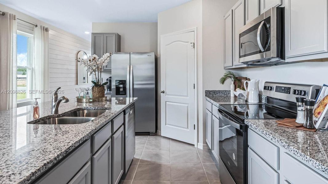 Furnished interior view inside a new home in Cascades, Davenport (Image 13).