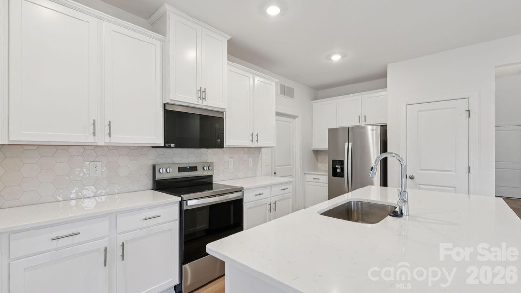 Photo is not of the actual home, but is an inspirational photo of builder’s model home and may depict options, furnishings, and/or decorator features that are not included