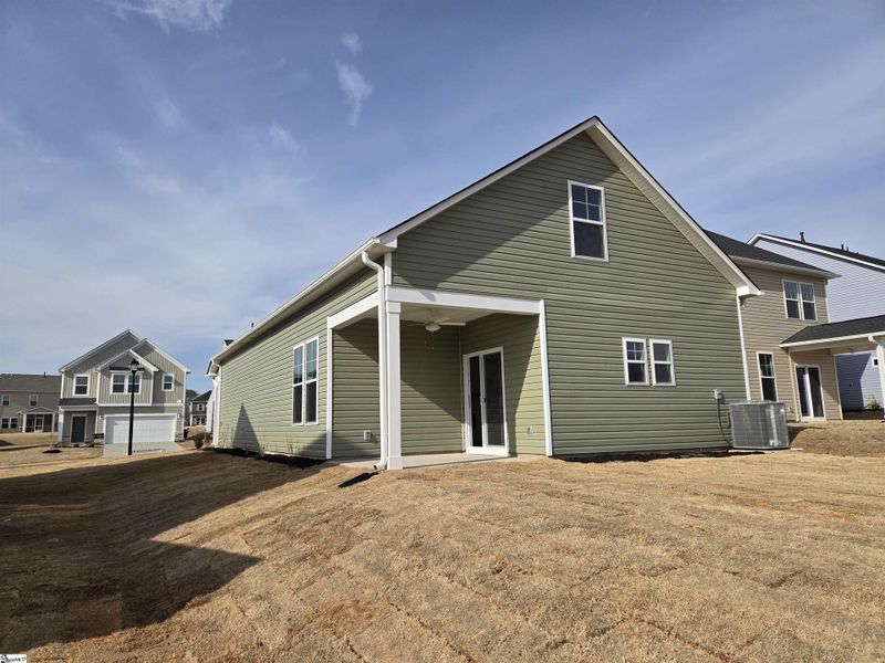 Exterior details and patio area of a home in Halton Oaks, Spartanburg (Image 20).