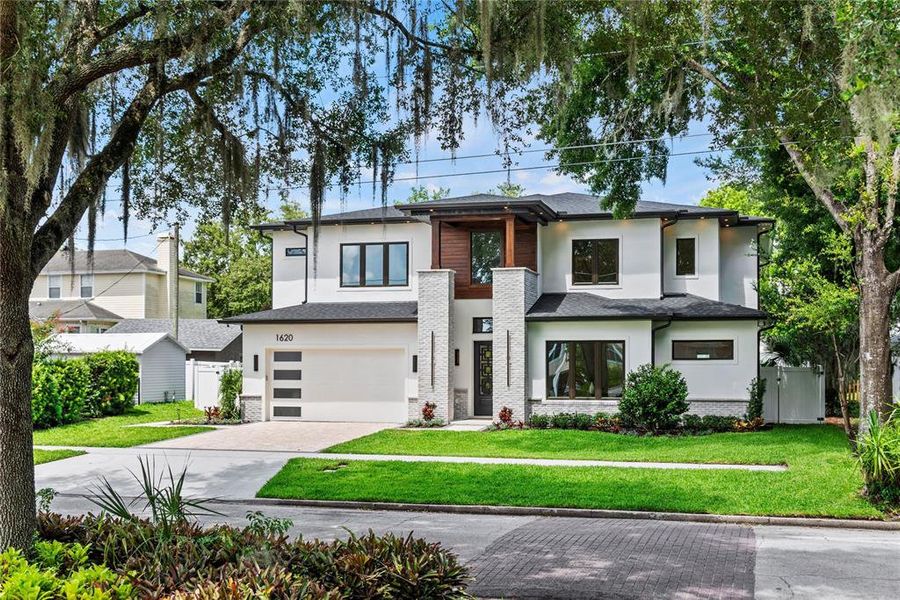 Front exterior of a new home in , Orlando, FL, highlighting curb appeal (Image 41). Front exterior of a new home in , Orlando, FL, highlighting curb appeal (Image 41).