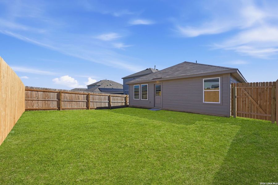 Exterior details and patio area of a home in Randolph Crossing, Converse (Image 2). Exterior details and patio area of a home in Randolph Crossing, Converse (Image 2).