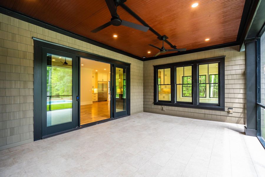 Exterior details and patio area of a home in , Johns Island (Image 56).