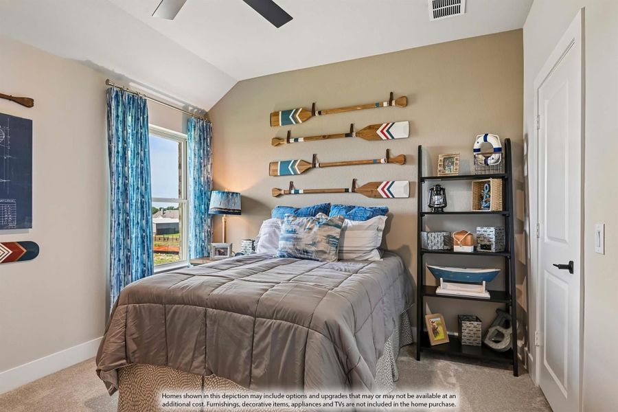 Bedroom with vaulted ceiling, decorative oars on wall, and black metal shelving unit beside the bed Bedroom with vaulted ceiling, decorative oars on wall, and black metal shelving unit beside the bed