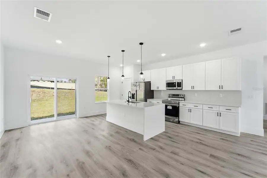Furnished interior view inside a new home in , Dunnellon (Image 4).