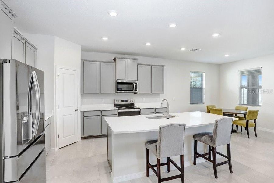 Furnished interior view inside a new home in Westgate at Avalon Park, Wesley Chapel (Image 10).