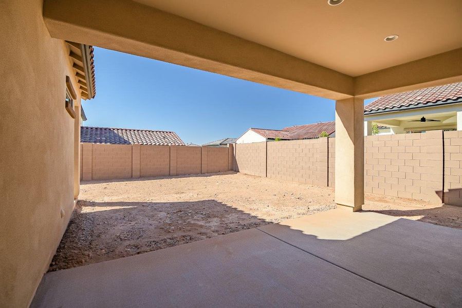 Exterior details and patio area of a home in Black Rock at Verrado, Buckeye (Image 25).
