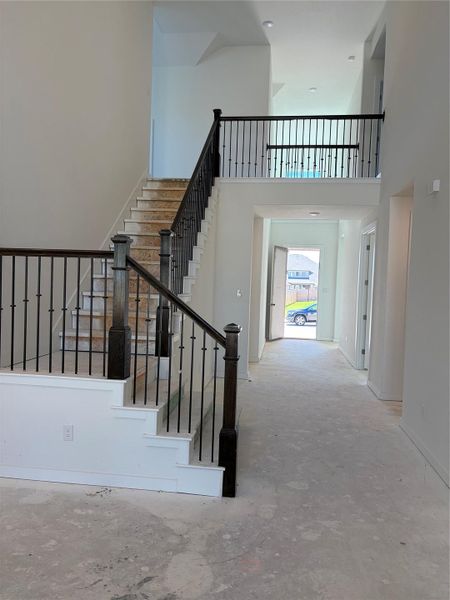 Beautiful staircase and soaring ceilings