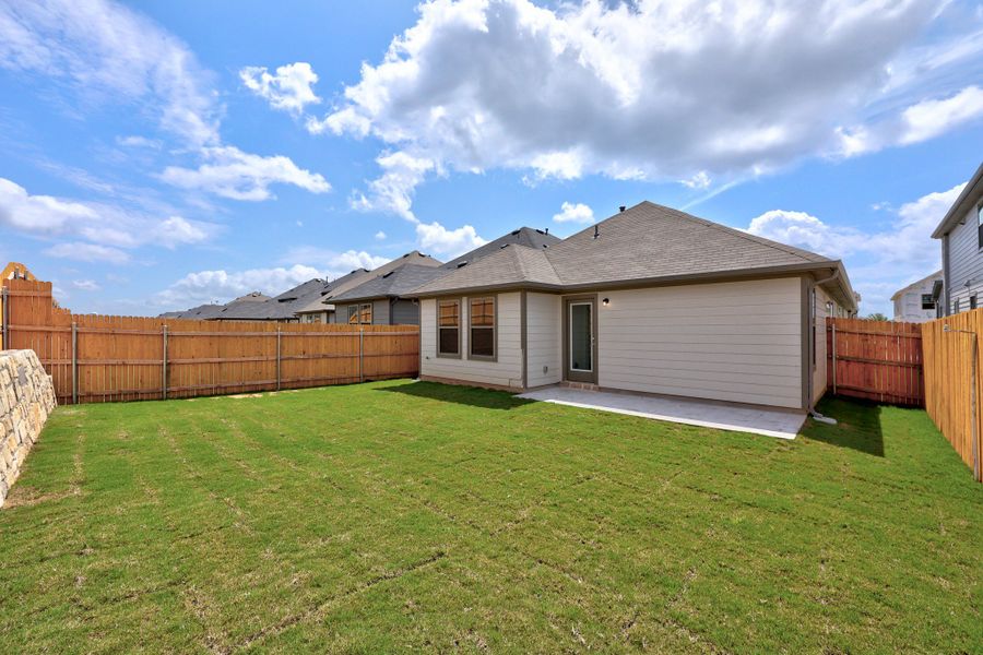 Exterior details and patio area of a home in Trinity Ranch, Elgin (Image 18).