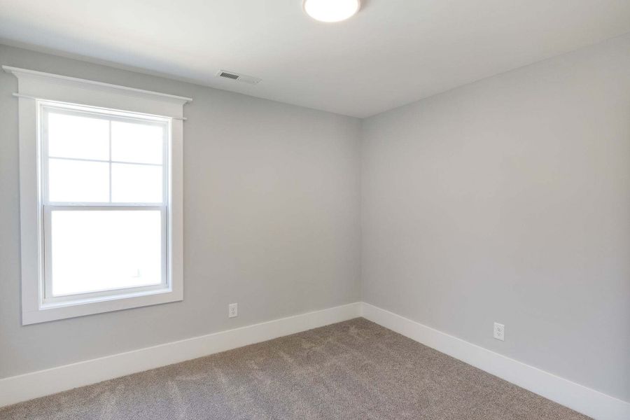 Representative unfurnished interior of a home built from the Austin by Caviness & Cates Communities in Bartlett Manor, Youngsville (Image 143).