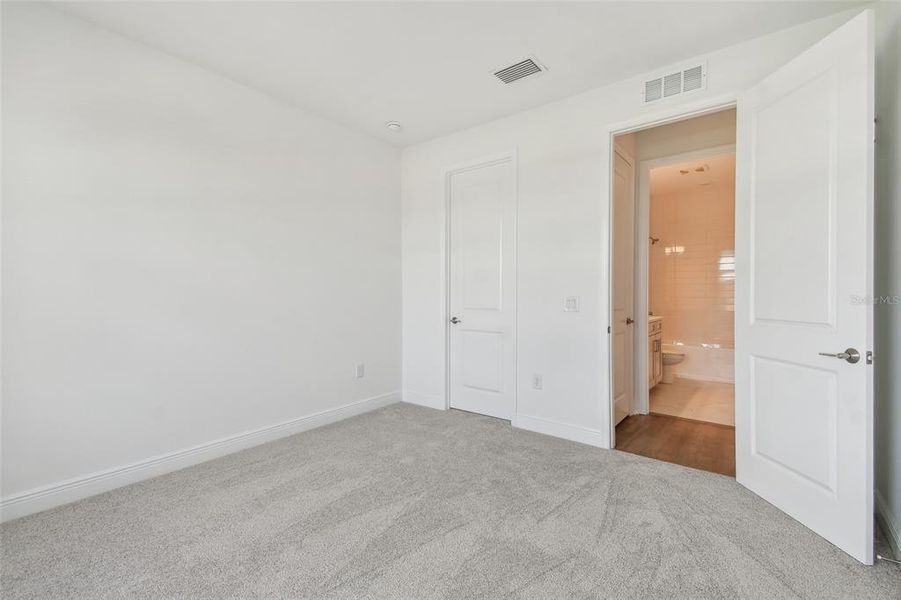 Spacious, unfurnished interior of a new home in Grand Park, Sarasota (Image 29). Spacious, unfurnished interior of a new home in Grand Park, Sarasota (Image 29).