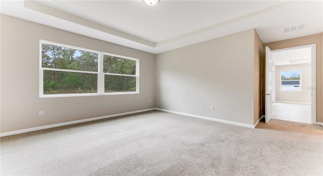 Spacious, unfurnished interior of a new home in Cresswind DeLand, Deland (Image 22).