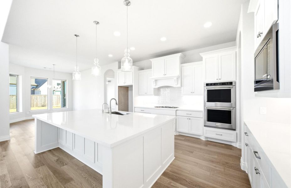 Furnished interior view inside a new home in Bridgeland 60′, Cypress (Image 12).