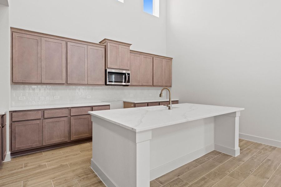 Furnished interior view inside a new home in Parmer Ranch, Georgetown (Image 8).