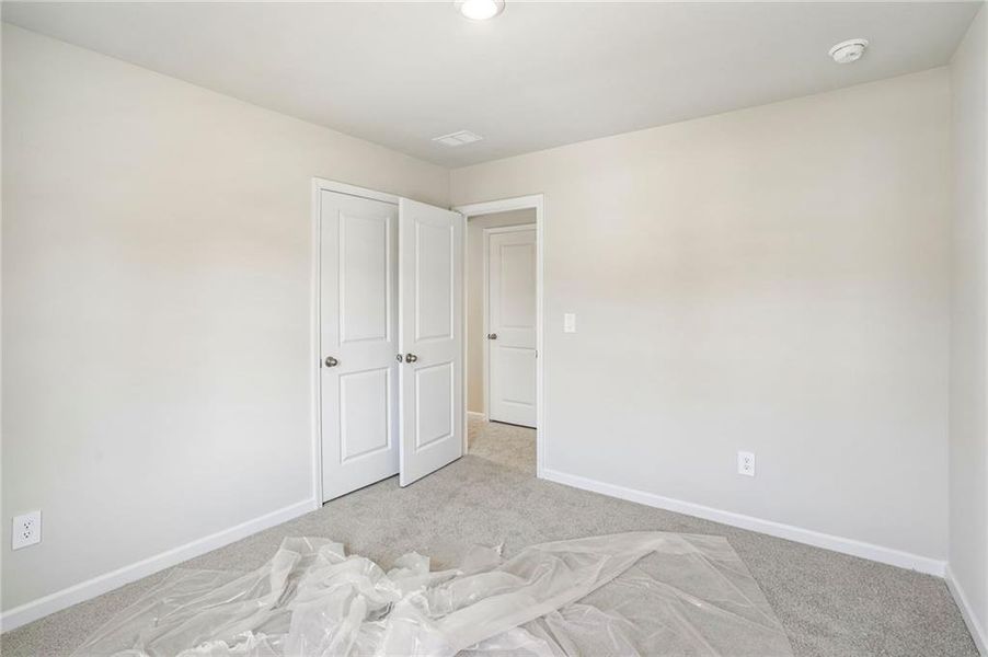 Spacious, unfurnished interior of a new home in Hawthorne Station, College Park (Image 28).