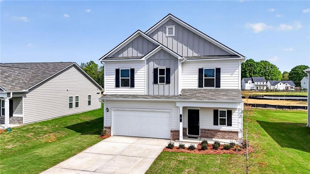 Front exterior of a new home in Southbend, Rome, GA, highlighting curb appeal (Image 1). Front exterior of a new home in Southbend, Rome, GA, highlighting curb appeal (Image 1).