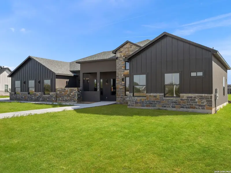 Front exterior of a new home in , Seguin, TX, highlighting curb appeal (Image 27). Front exterior of a new home in , Seguin, TX, highlighting curb appeal (Image 27).