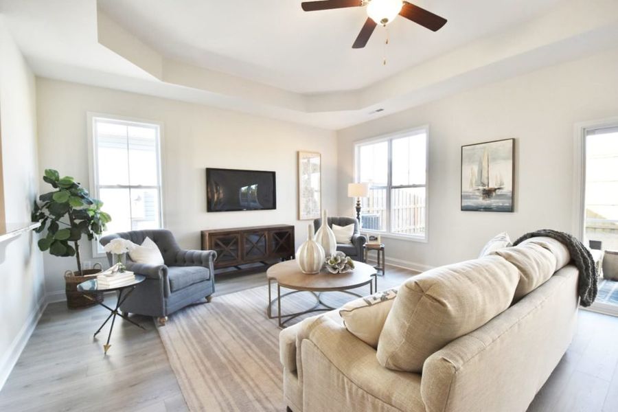 Furnished interior in a model home at Parkwood Estates in Leland (Image 28).