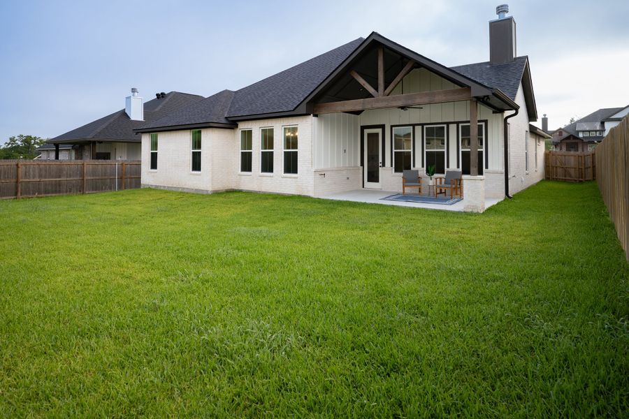 Front exterior of a new home in Greenbrier, Bryan, TX, highlighting curb appeal (Image 23).