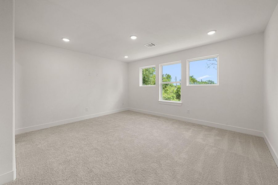 Full bathroom in the upstairs flex space, that can be used as a game room, or double as an office / guest room.