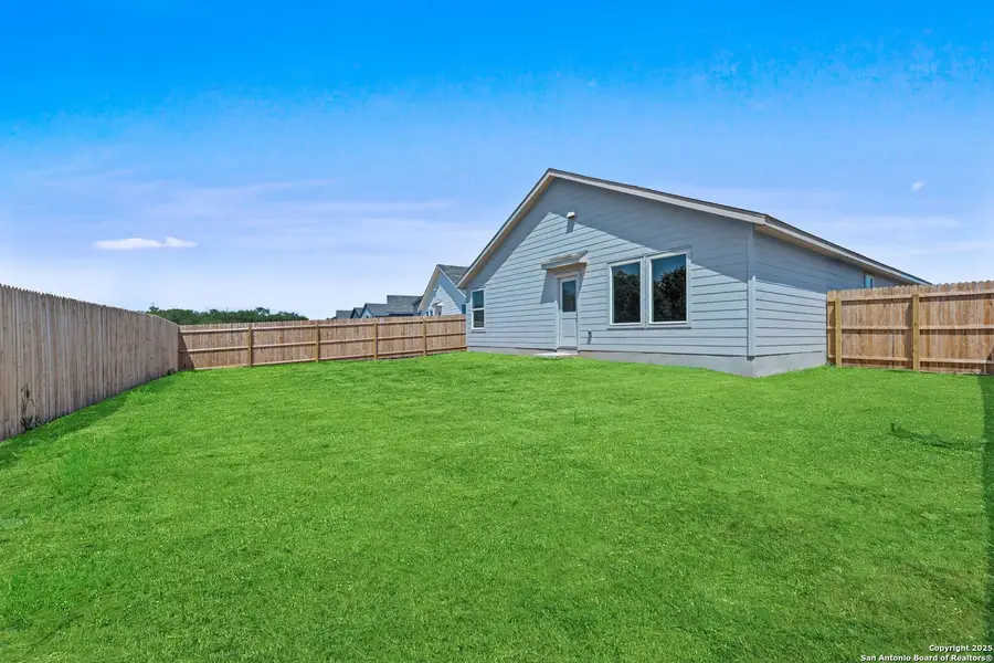 Exterior details and patio area of a home in Lodi Grove, Floresville (Image 2). Exterior details and patio area of a home in Lodi Grove, Floresville (Image 2).