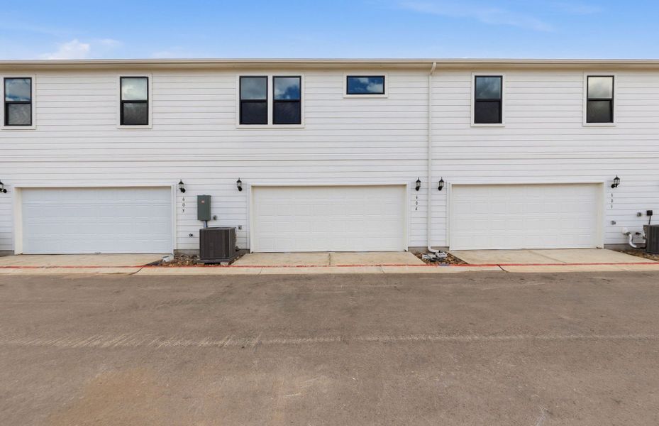 Exterior details and patio area of a home in Monarch on Main, Round Rock (Image 18).