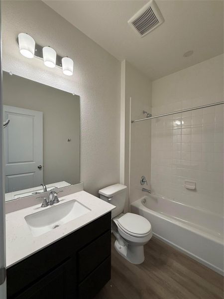 Furnished interior view inside a new home in River Bluff, Leander (Image 14). Furnished interior view inside a new home in River Bluff, Leander (Image 14).