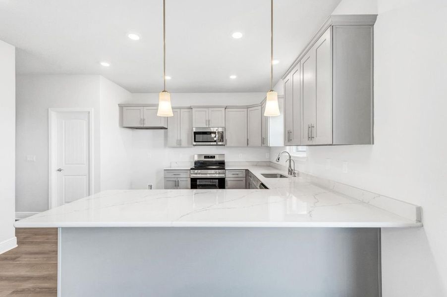 Representative furnished interior of a home built from the Plan 2290 by Adams Homes in College Station, Panama City (Image 6). Representative furnished interior of a home built from the Plan 2290 by Adams Homes in College Station, Panama City (Image 6).