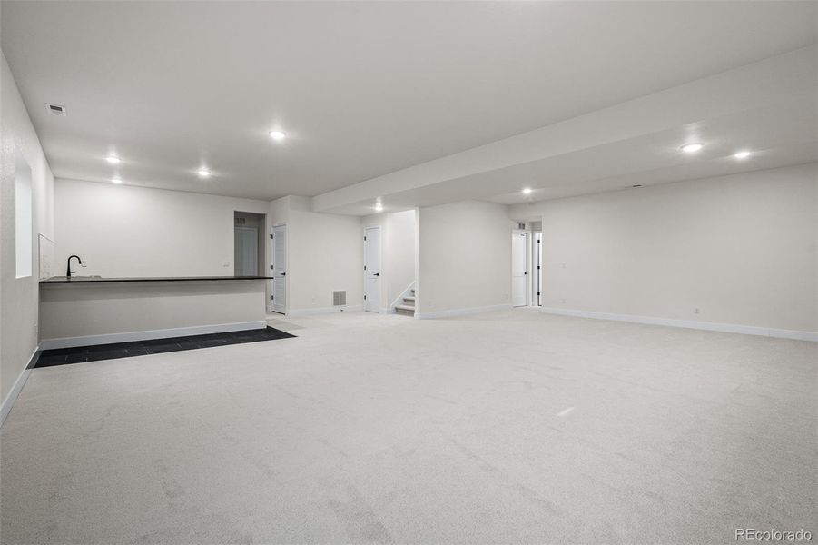 Spacious, unfurnished interior of a new home in Wolf Ranch - Enclave Collection, Colorado Springs (Image 31).