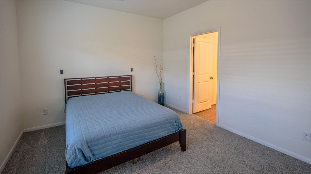 Furnished interior view inside a new home in Woodshore, Clute (Image 11).