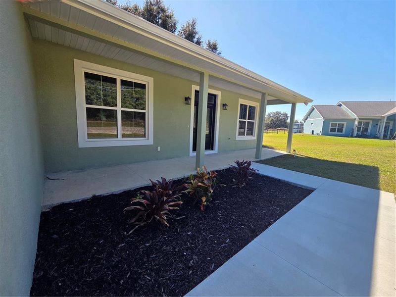 Exterior details and patio area of a home in , Citrus Springs (Image 30).