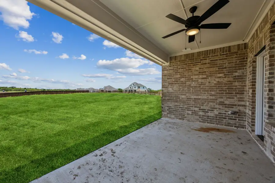 Exterior details and patio area of a home in Ellis Ranch Estates, Waxahachie (Image 3).