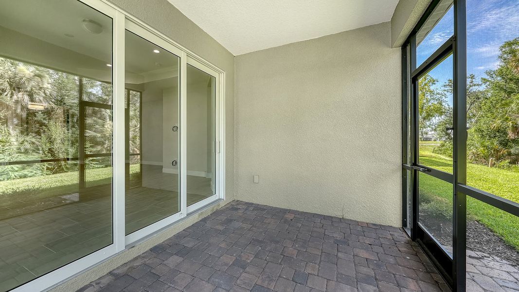 Exterior details and patio area of a home in Wildleaf Real Estate and Homes for Sale in Parrish, FL - Neal Communities, Parrish (Image 21).