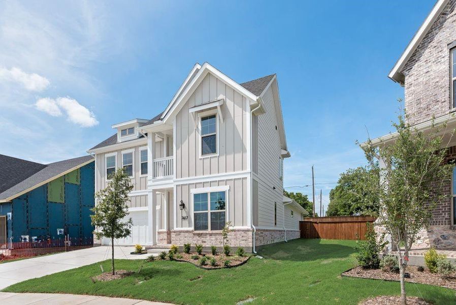 Front exterior of a new home in Bayside, Rowlett, TX, highlighting curb appeal (Image 21).
