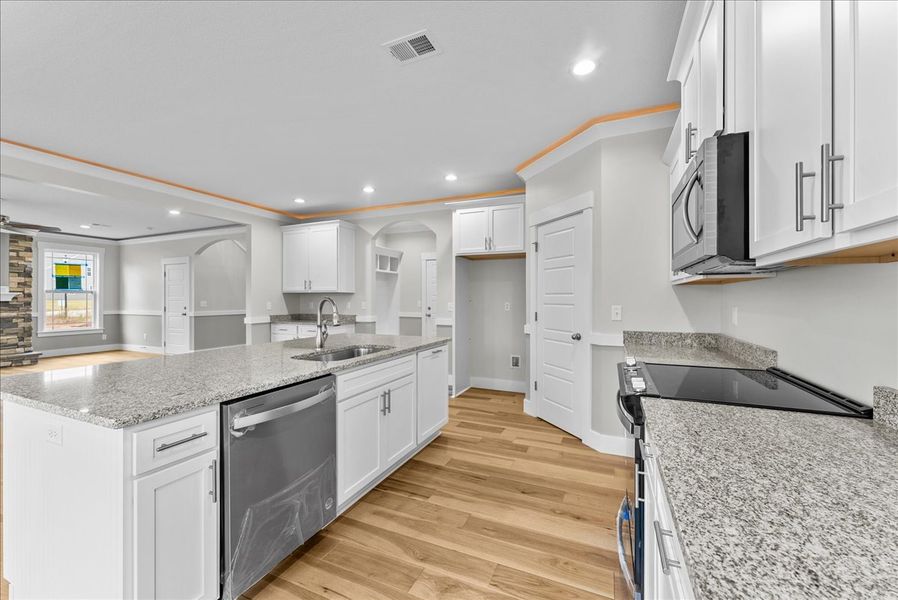 Representative furnished interior of a home built from the Emilia Elite by Enchanted Homes in Pointe Summit, Slater-Marietta (Image 8).