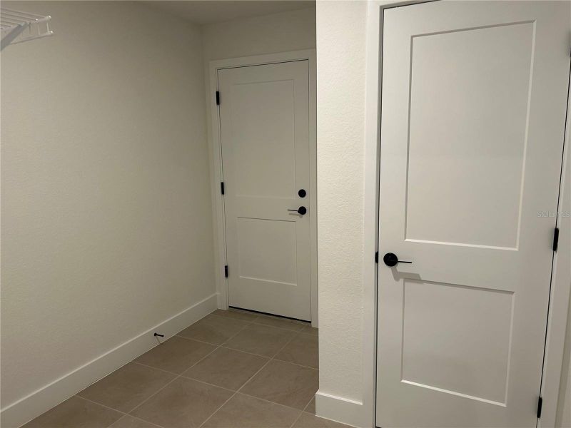 Spacious, unfurnished interior of a new home in Watercress Cove, North Port (Image 17). Spacious, unfurnished interior of a new home in Watercress Cove, North Port (Image 17).