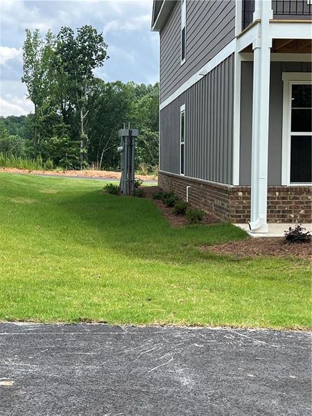 Front exterior of a new home in , Gainesville, GA, highlighting curb appeal (Image 29). Front exterior of a new home in , Gainesville, GA, highlighting curb appeal (Image 29).