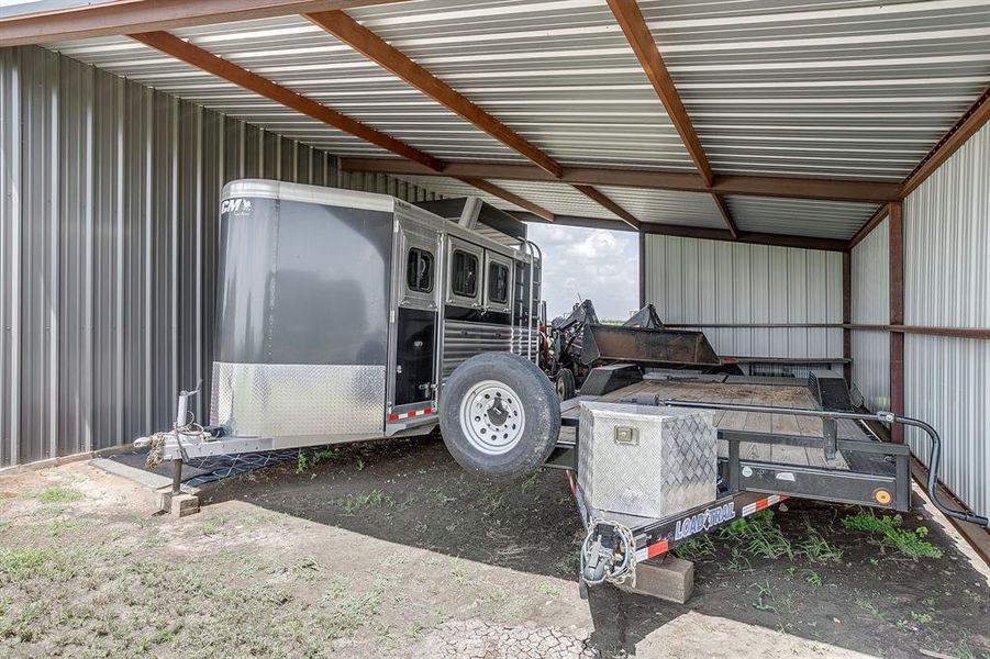 Covered parking attached to the shop