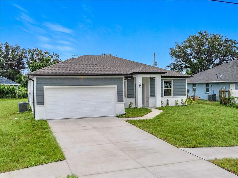 Front exterior of a new home in , North Port, FL, highlighting curb appeal (Image 25).