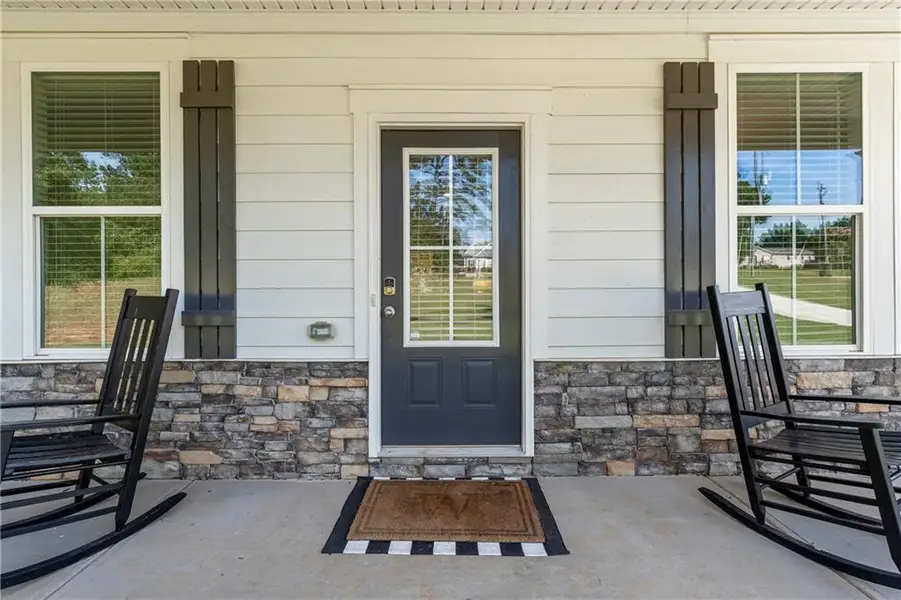 Exterior details and patio area of a home in Crossing Creeks, Monroe (Image 4). Exterior details and patio area of a home in Crossing Creeks, Monroe (Image 4).