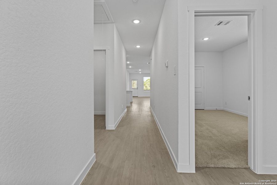 Spacious, unfurnished interior of a new home in Waterwheel: Coastline Collection, San Antonio (Image 8).