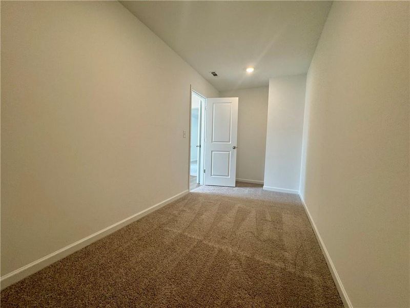 Spacious, unfurnished interior of a new home in Eastlyn Crossing - Single Family, Flowery Branch (Image 43). Spacious, unfurnished interior of a new home in Eastlyn Crossing - Single Family, Flowery Branch (Image 43).