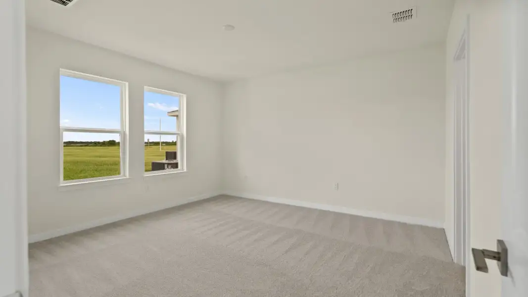 The Naples First Floor Primary Suite Quick Move-In Home at Willowbrook North by DRB Homes in Winter Haven, FL