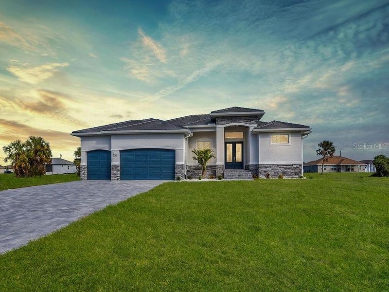 Front exterior of a new home in , Rotonda West, FL, highlighting curb appeal (Image 1).