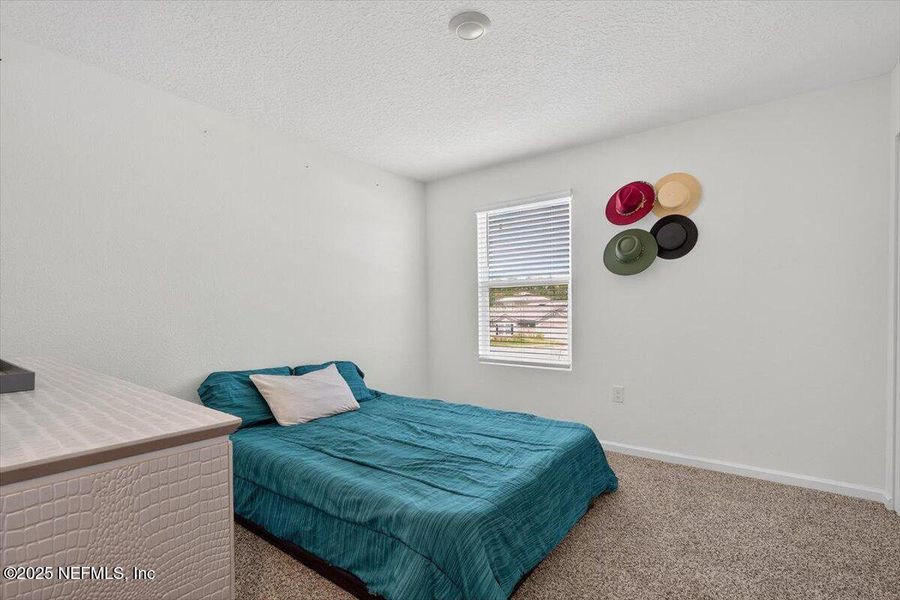Furnished interior view inside a new home in River Glen Express, Yulee (Image 16).