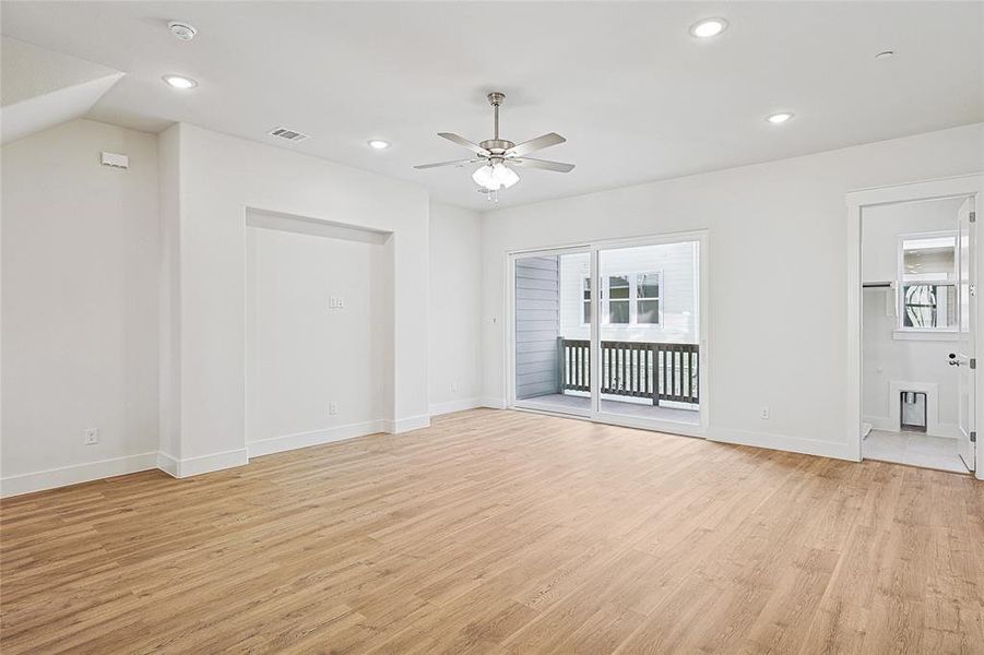 Unfurnished living room with ceiling fan, light wood-style flooring, and recessed lighting