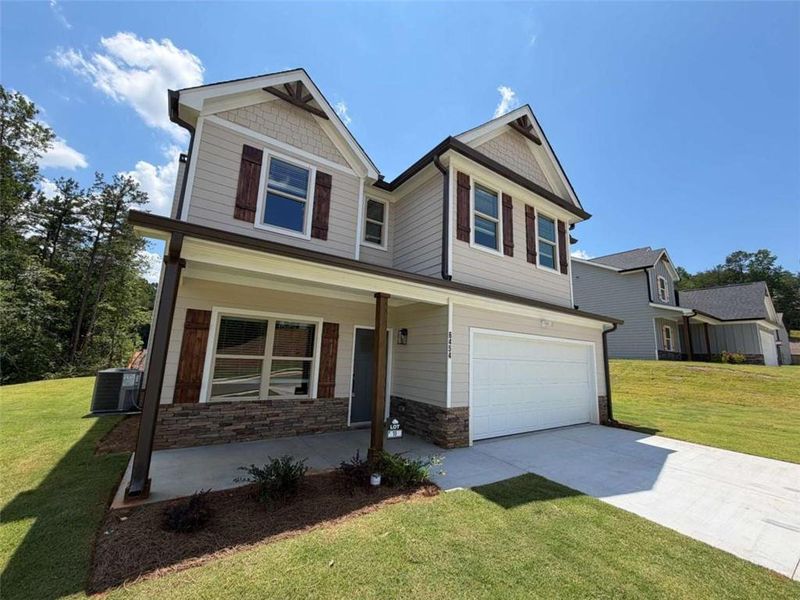 Front exterior of a new home in , Lula, GA, highlighting curb appeal (Image 19). Front exterior of a new home in , Lula, GA, highlighting curb appeal (Image 19).