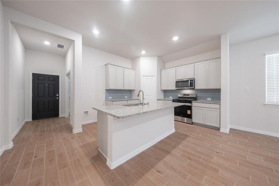 Furnished interior view inside a new home in Lake Pointe: Lake Pointe at Paloma Creek, Little Elm (Image 7). Furnished interior view inside a new home in Lake Pointe: Lake Pointe at Paloma Creek, Little Elm (Image 7).