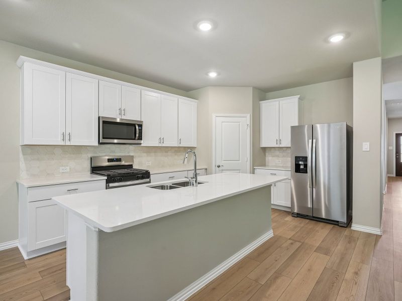 Furnished interior view inside a new home in Parks at Foster Crossing - Premier Series, Anna (Image 7).